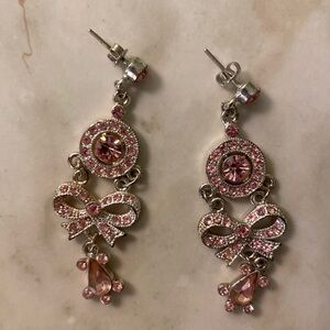 Long silver tone 2 inch pink rhinestone dangling bow pierced earrings